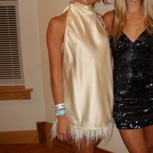 We wore what white feather silk mini dress